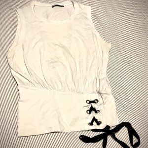 White sleeveless top